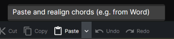The Paste button in the editor toolbar with the menu open showing the &ldquo;Paste and realign chords&rdquo; option
